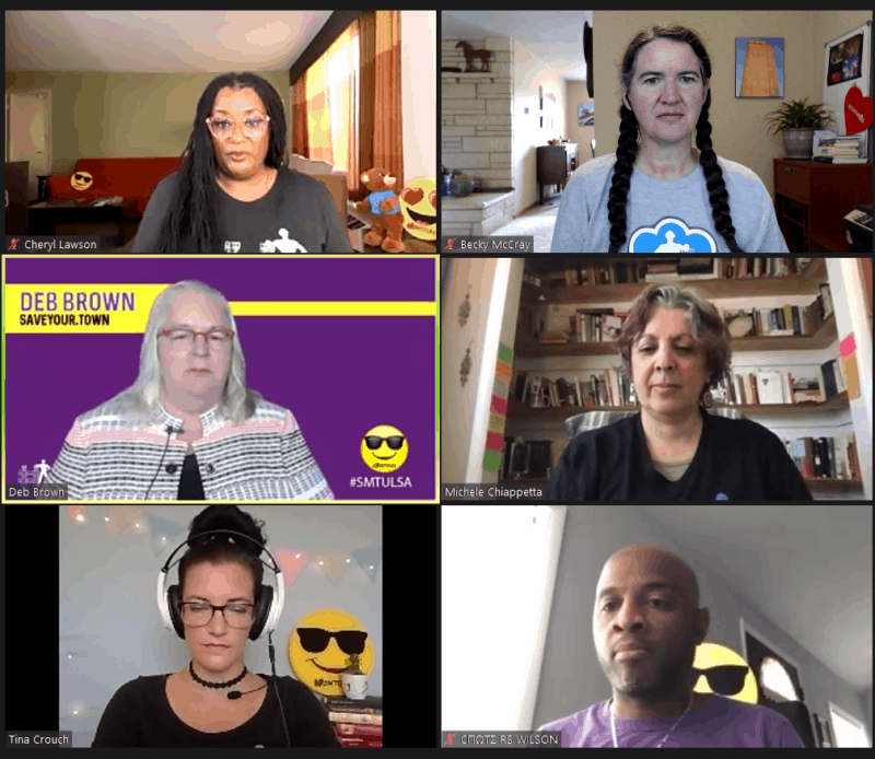 A group of six people streaming video in an event.